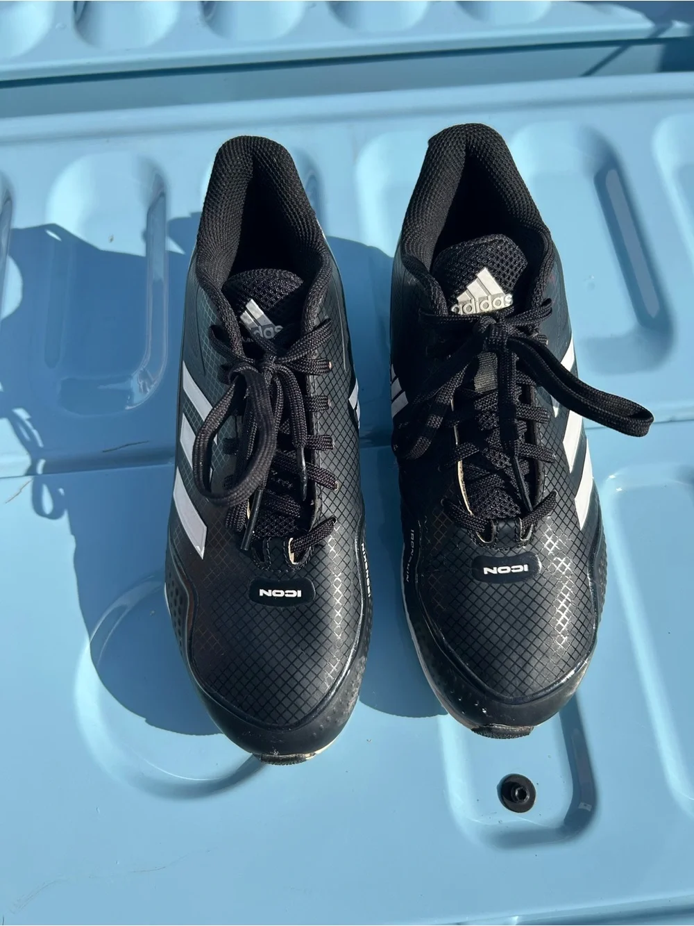 adidas Men’s Black and White ICON Athletic Cleats